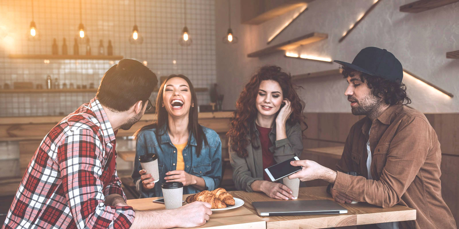 a group of college students at a restaurant searching for double date ideas in Northern Virginia